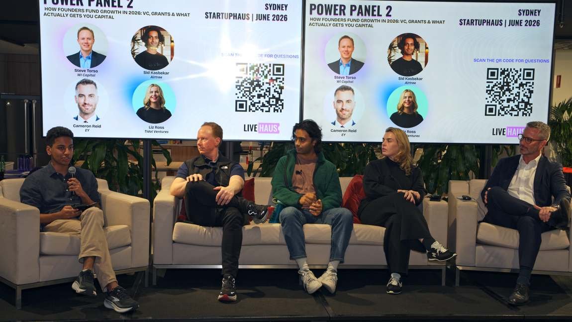 StartupHaus power panel, six speakers on stage